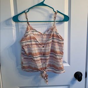 a pink, white, and grey striped tank top